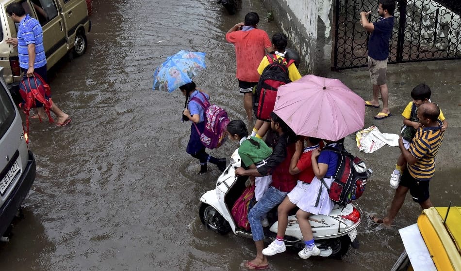 heavy rain and water logging in delhi ncr causes traffic jam on roads