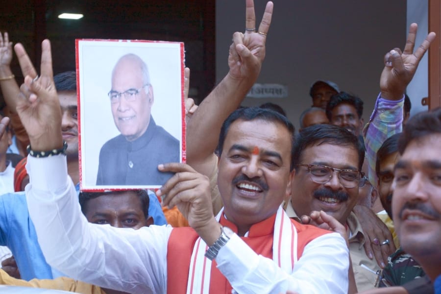BJP activists celebrate Ramnath Kovind's victory in Lucknow in Uttar Pradesh.