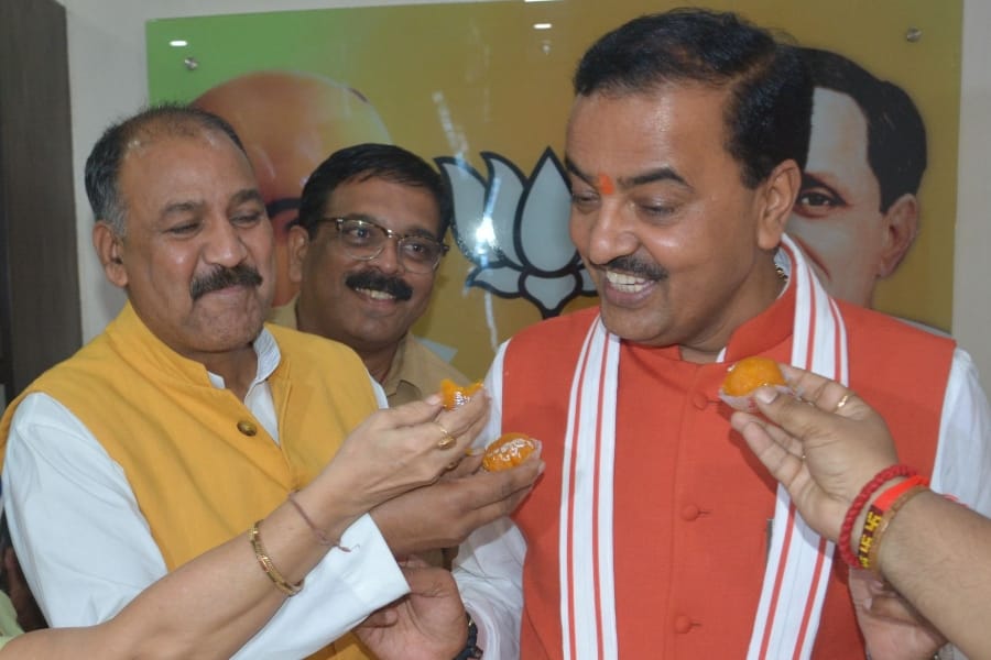 BJP activists celebrate Ramnath Kovind's victory in Lucknow in Uttar Pradesh.