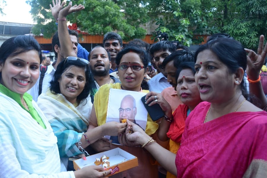 BJP activists celebrate Ramnath Kovind's victory in Lucknow in Uttar Pradesh.