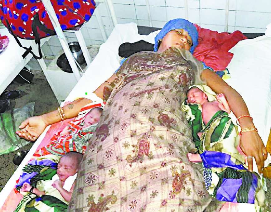 Woman gave birth to three children, all healthy
