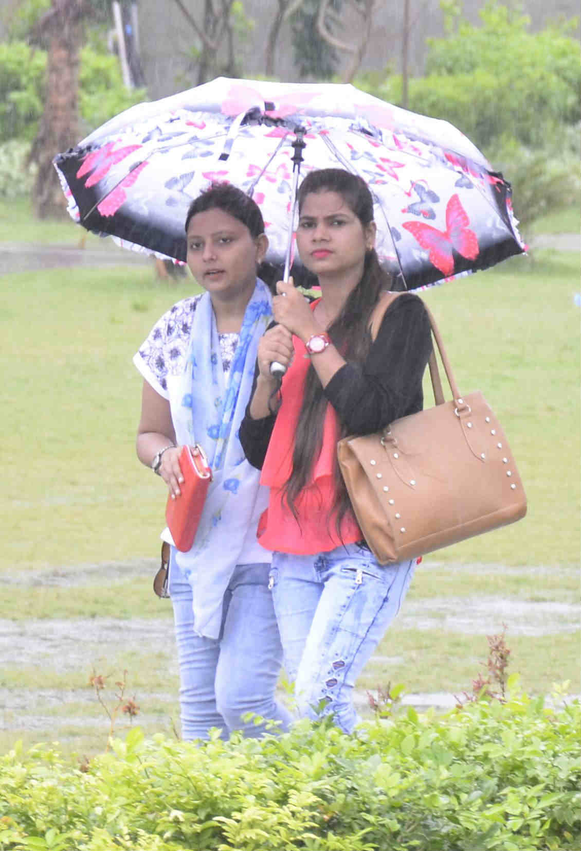 youngsters enjoying the rain
