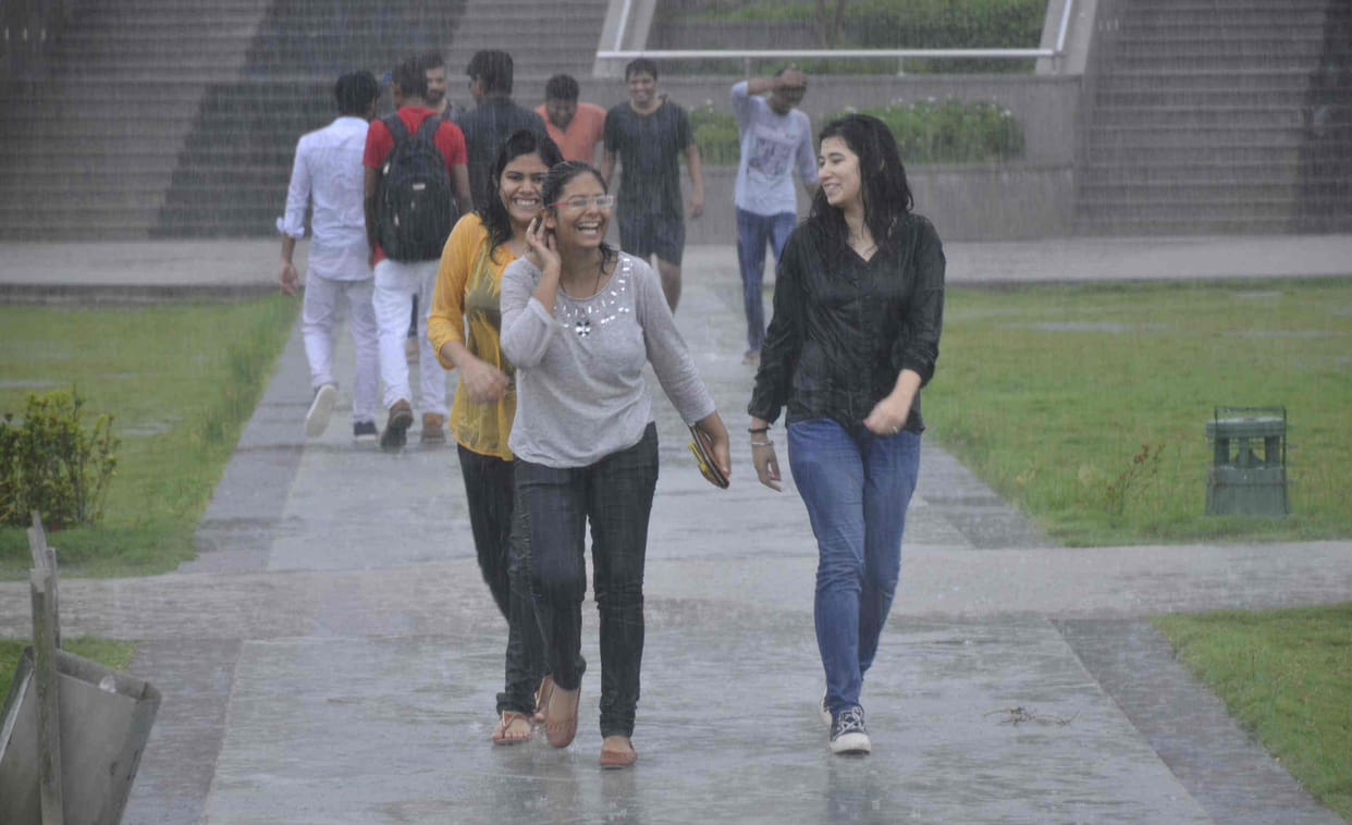 youngsters enjoying the rain