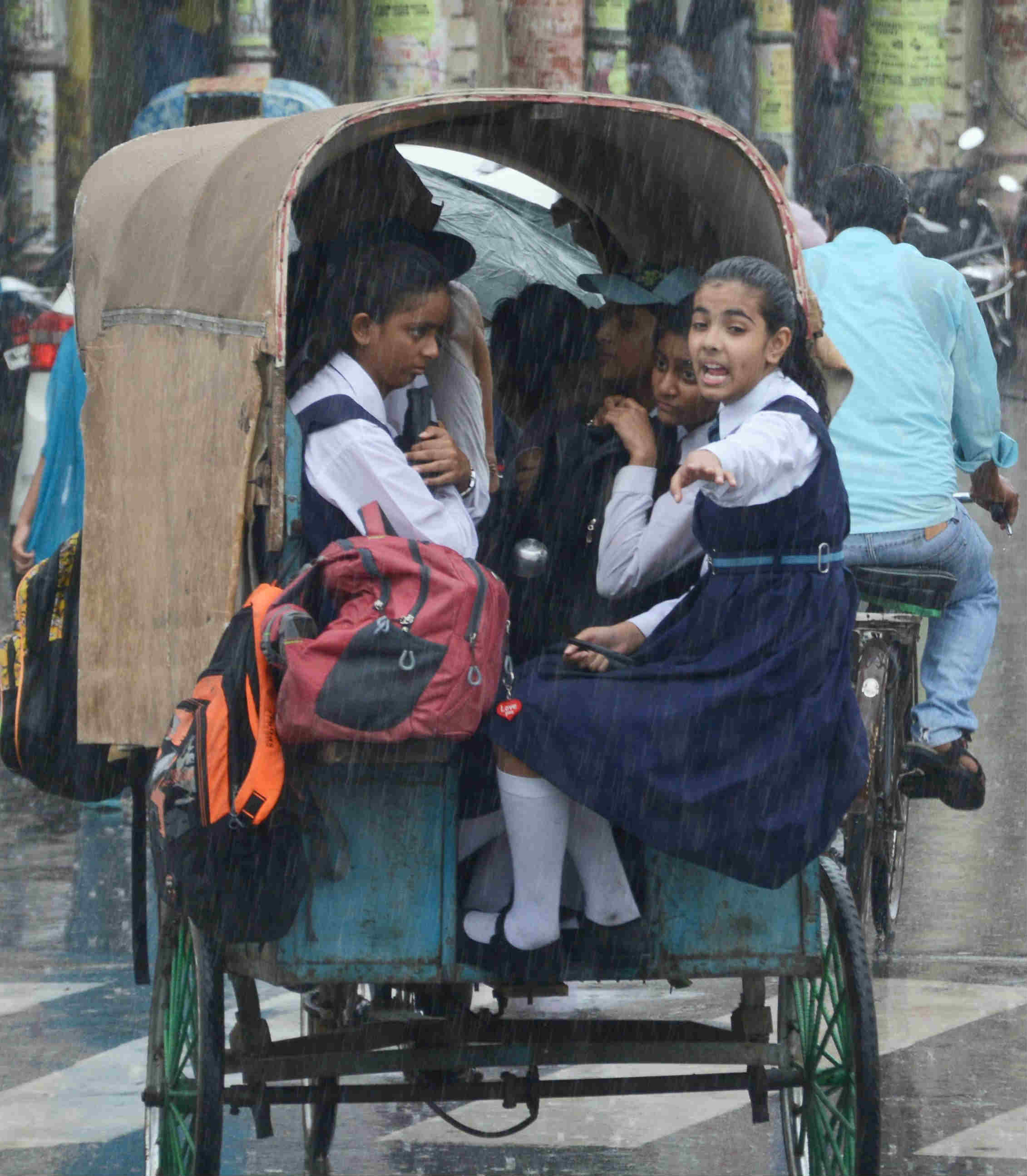 youngsters enjoying the rain
