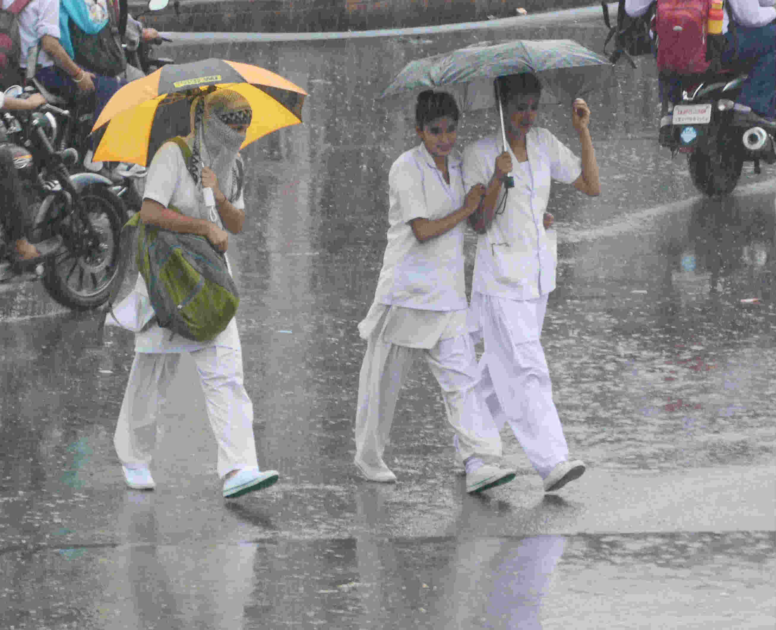 youngsters enjoying the rain