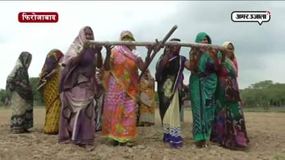 IN FIROZABAD WOMAN laying the ground FOR RAIN