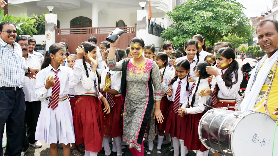 Children who came to see president house happily flirt dancing