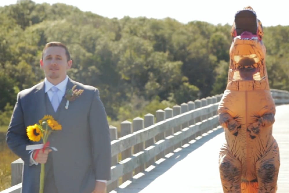Bride big reveal in t-rex costume will melt your heart