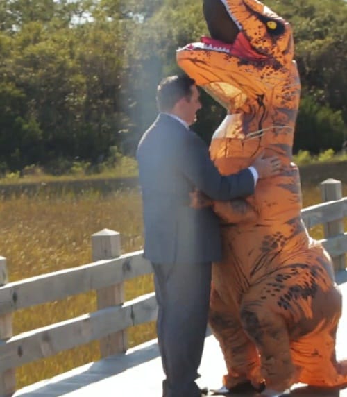 Bride big reveal in t-rex costume will melt your heart