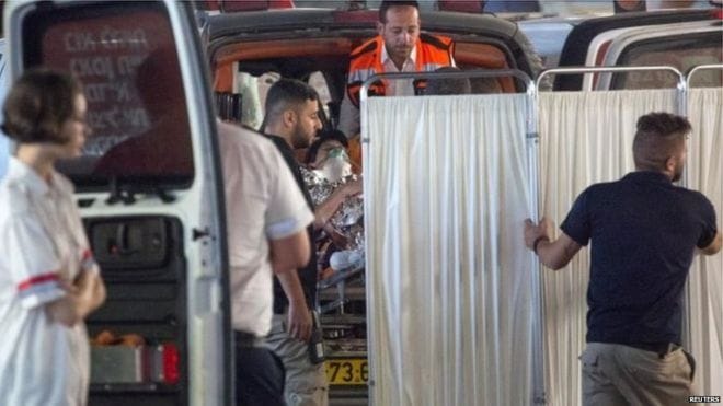 Three Israeli civilians stabbed to death