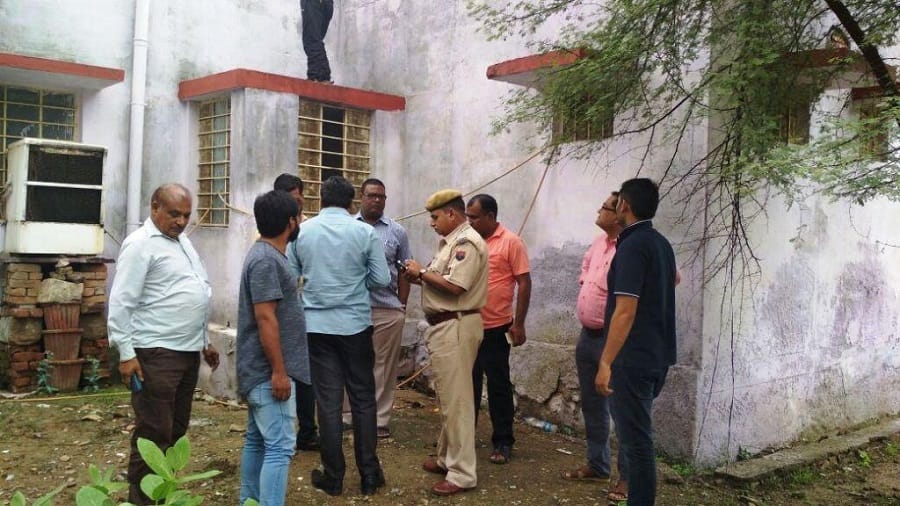 acb went to trap a head constable he jumped over the ceiling of police station and escaped 