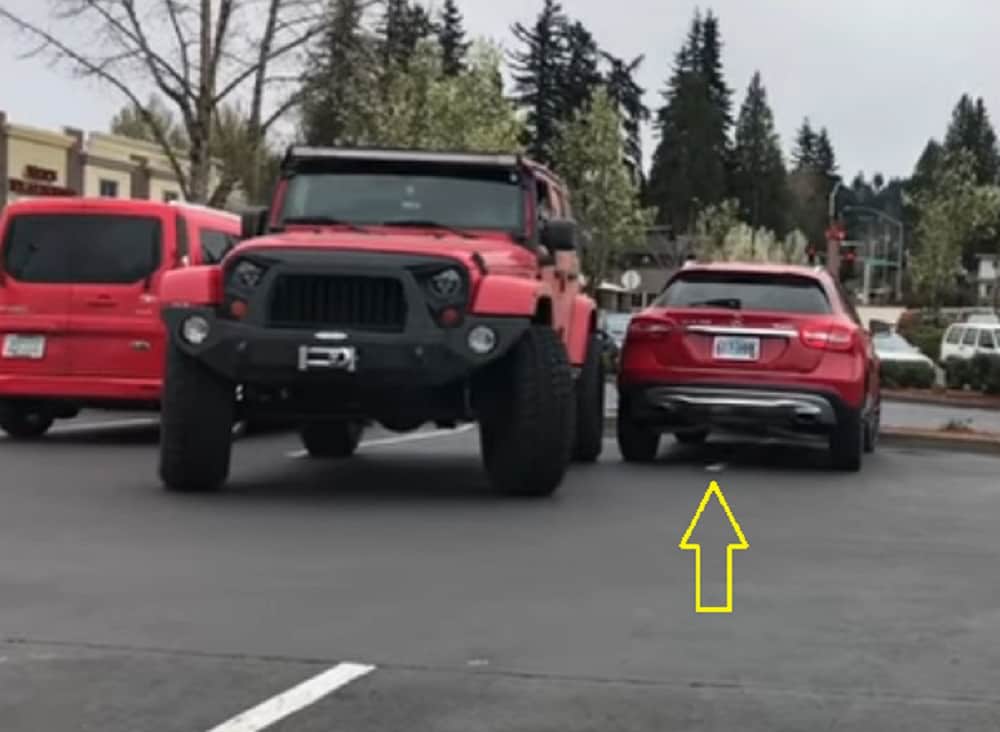 Guy parked car in two parking space gets shock when   returns