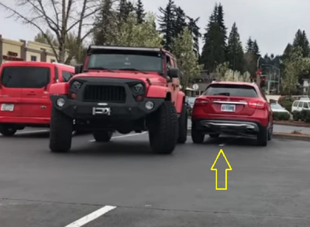 Guy parked car in two parking space gets shock when   returns