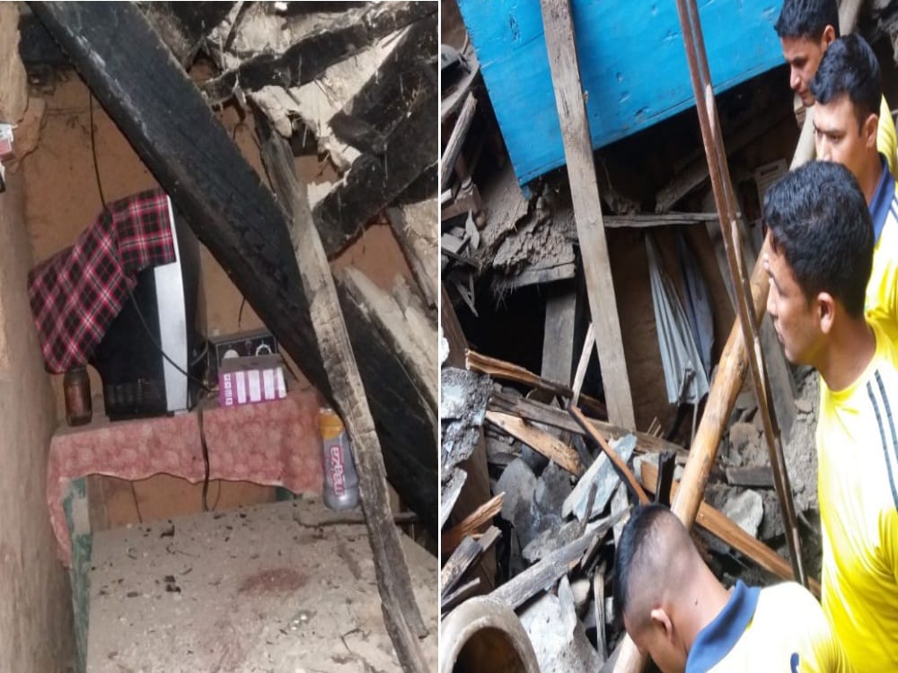 House collapse after landslide and heavy rain