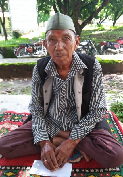 Aged contractor sitting on fast for demand of payment
