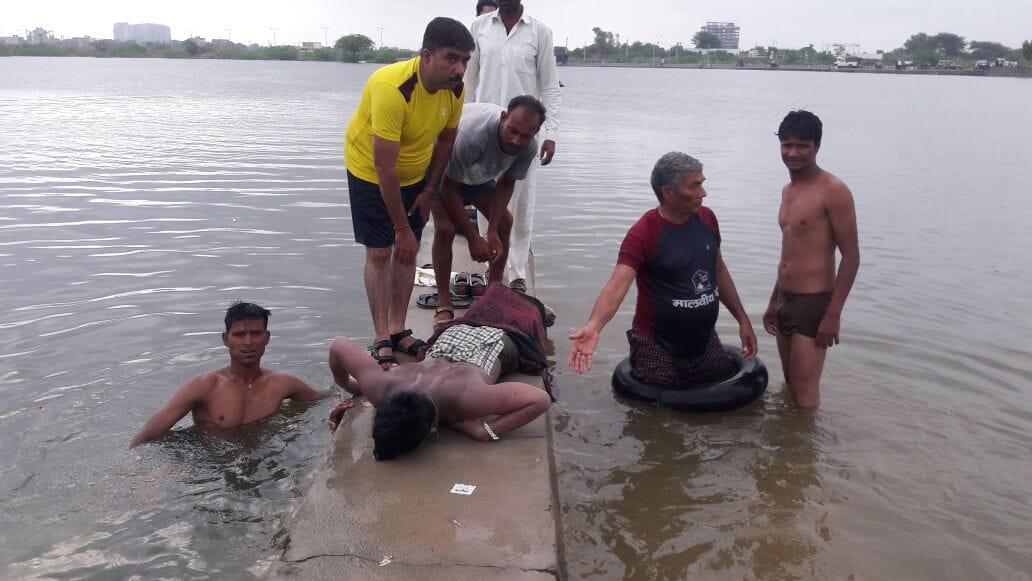 dead bodies out after 18 hours from Gandhana pond