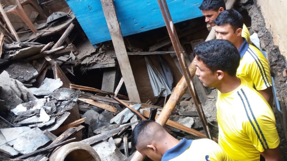 House collapse after landslide and heavy rain