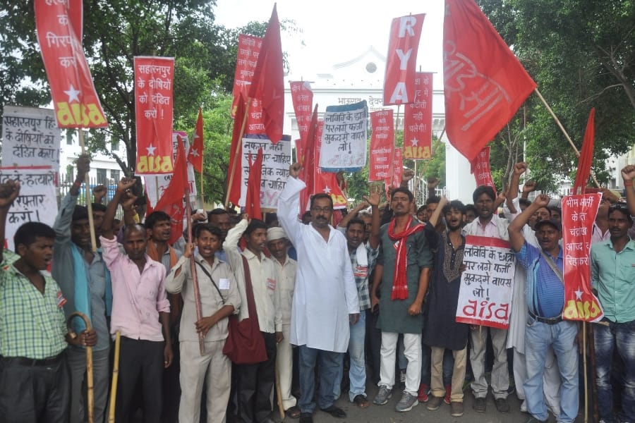  AISA members protest in front of Lucknow University.