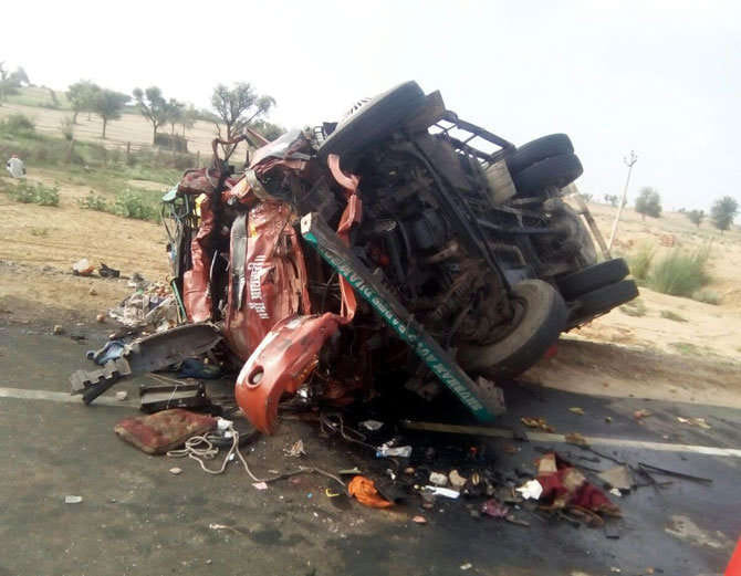 Container and truck collide, two people die