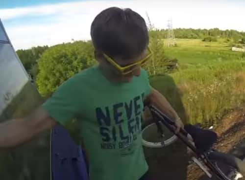 Watch viral video of 2 boys driving bycycle on   rooftop of moving train