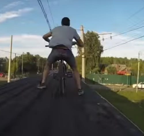 Watch viral video of 2 boys driving bycycle on   rooftop of moving train