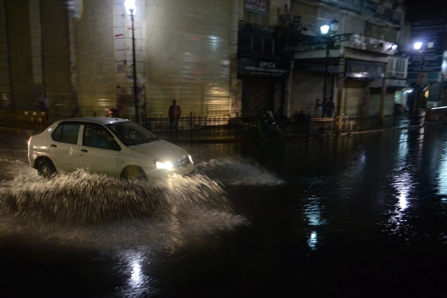 see pics of heavy rain in Lucknow.