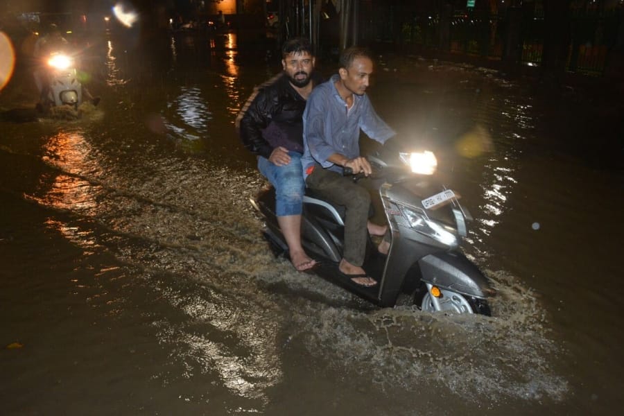 see pics of heavy rain in Lucknow.