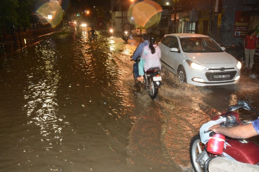 see pics of heavy rain in Lucknow.