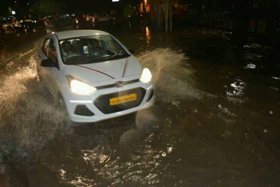 see pics of heavy rain in Lucknow.