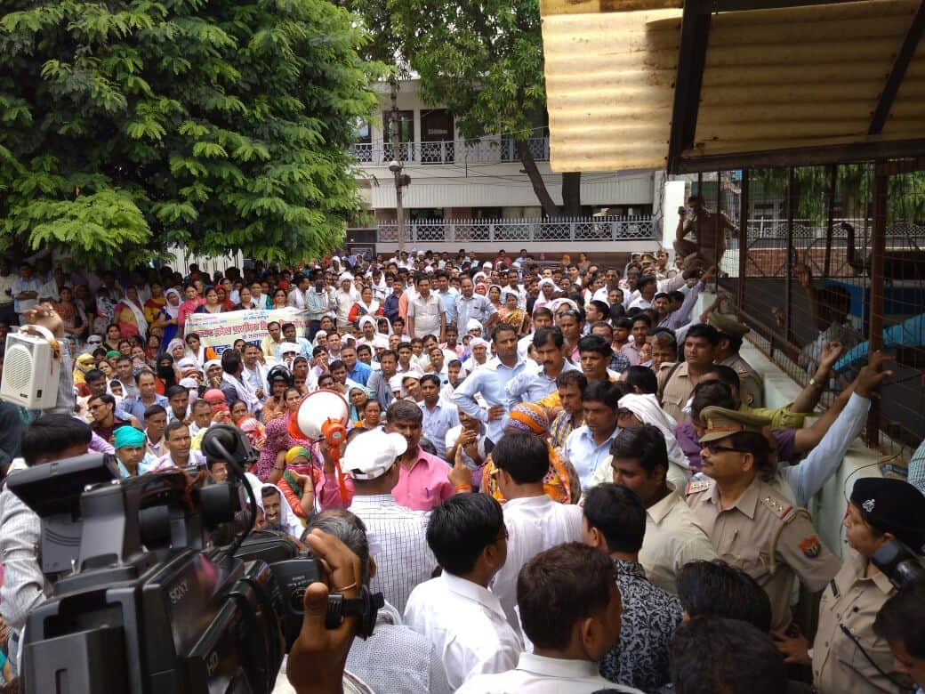 shikshamitra protesting outside office of hema malini in mathura