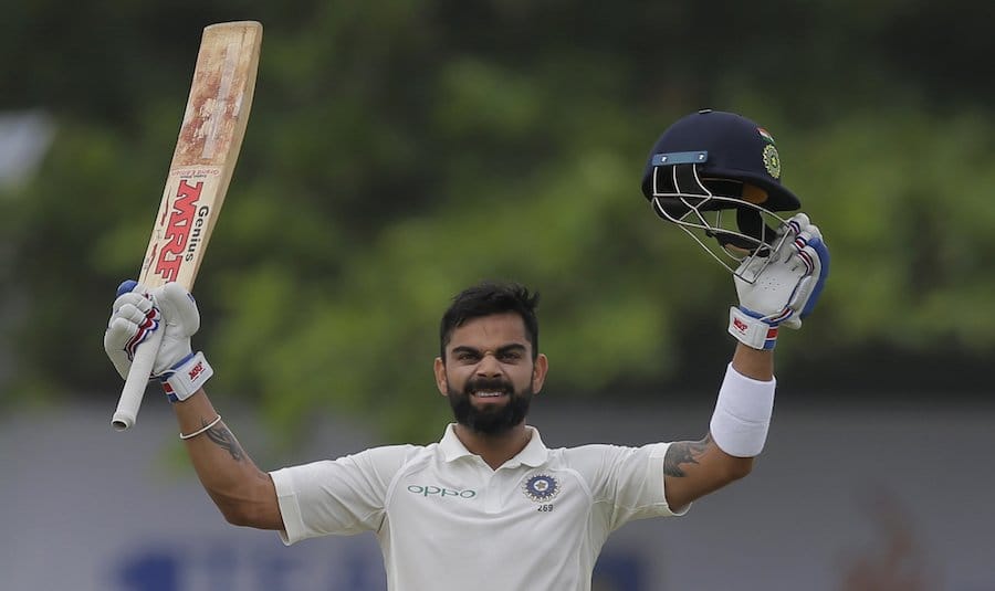 virat kohli slams 17th test century and records tumble
