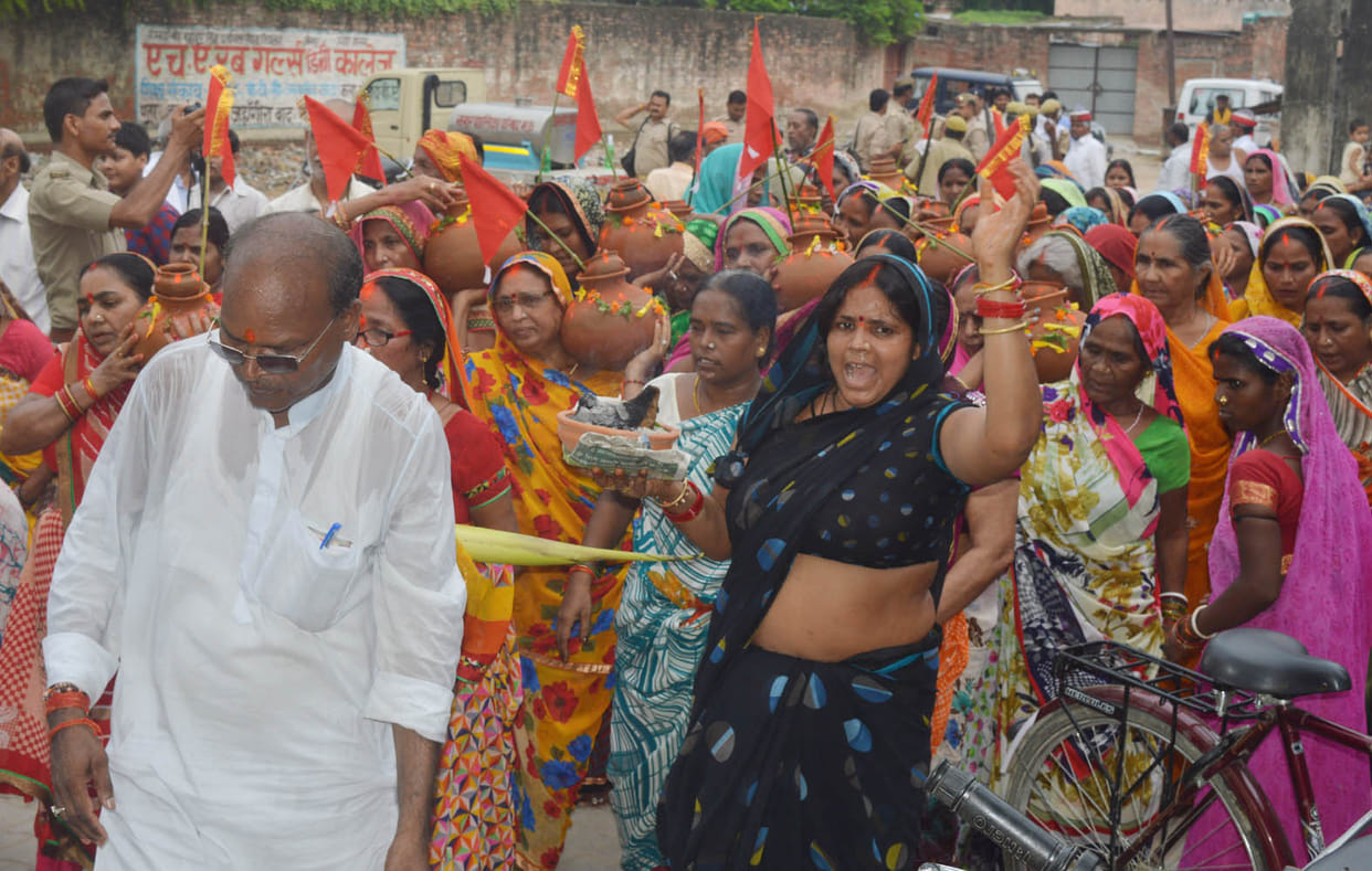 Women remove kalashatra