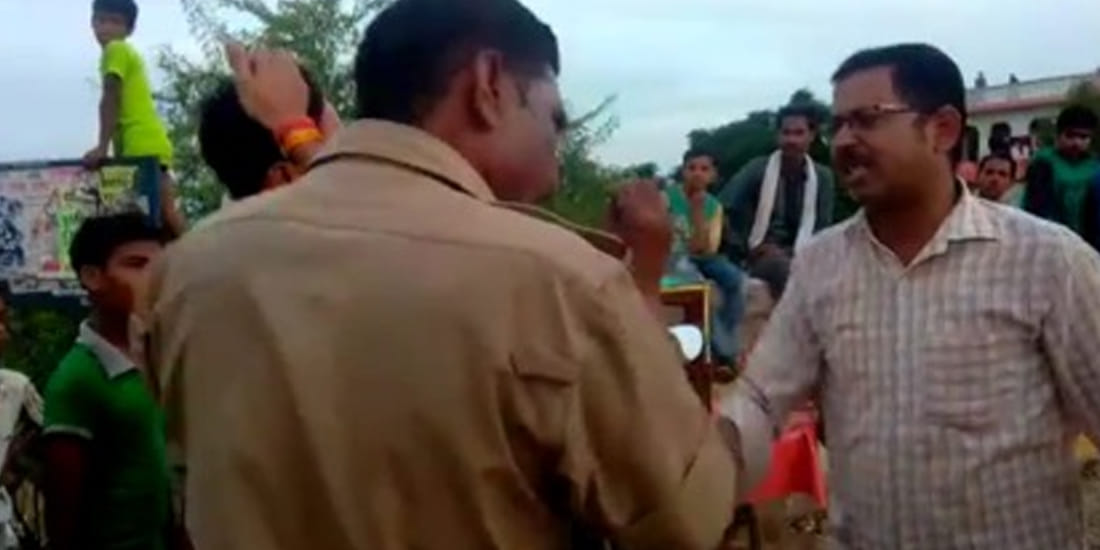 police inspector head down in bjp leaders feet after clash