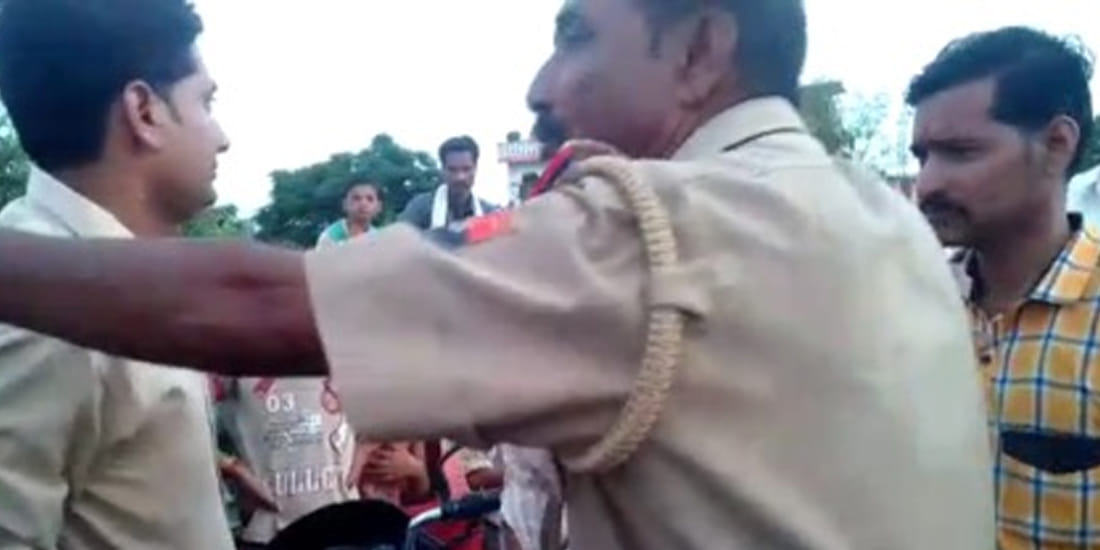police inspector head down in bjp leaders feet after clash