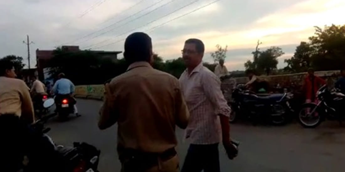 police inspector head down in bjp leaders feet after clash