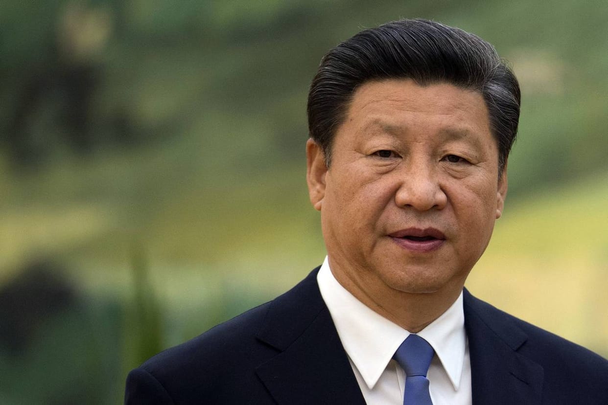 Jinping wearing army dresses to warned India