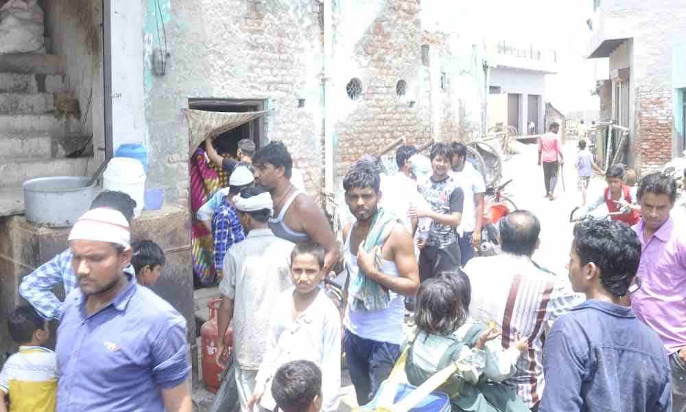 woman in mathura doing this to prevent hair cut