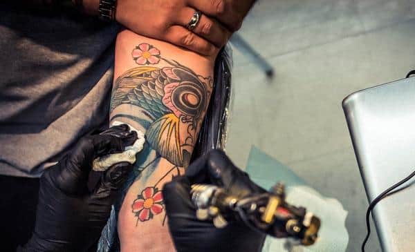 Meeting on side effects of tattoo on skin