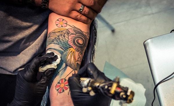 Meeting on side effects of tattoo on skin