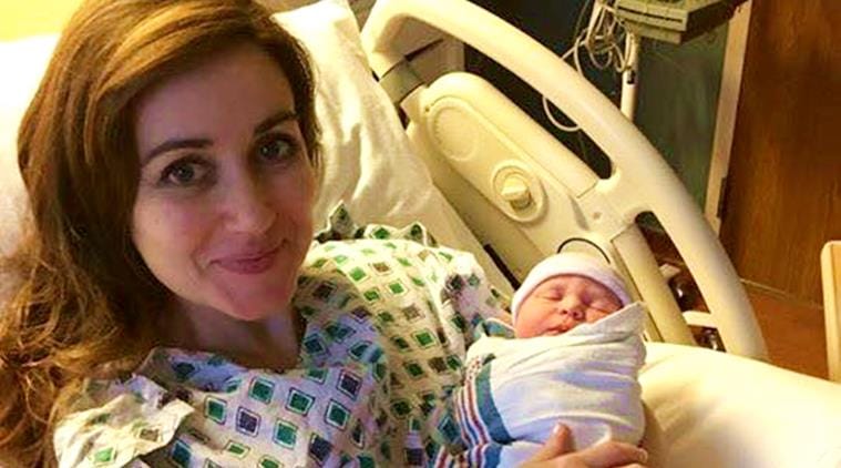 Kentucky-based doctor Amanda paused her own delivery to help   patient in labour pain