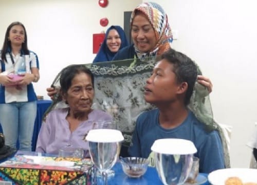 16 year old jealous husband Selamat locks  his 71 year old wife Rohaya in Indonesia