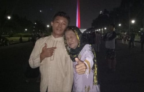 16 year old jealous husband Selamat locks  his 71 year old wife Rohaya in Indonesia