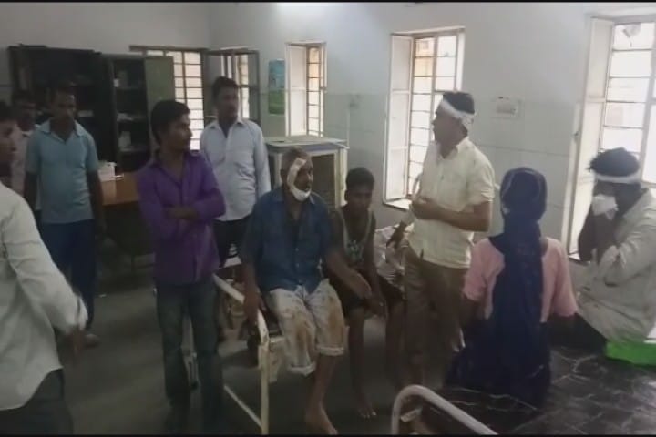 one dozen people injured in land dispute