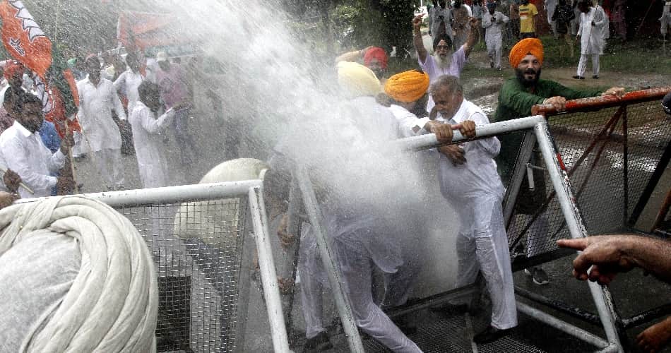 water cannon on protesters, chandigarh news