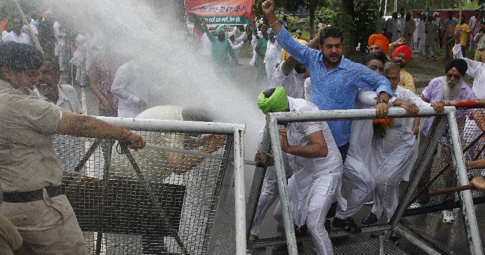 water cannon on protesters, chandigarh news