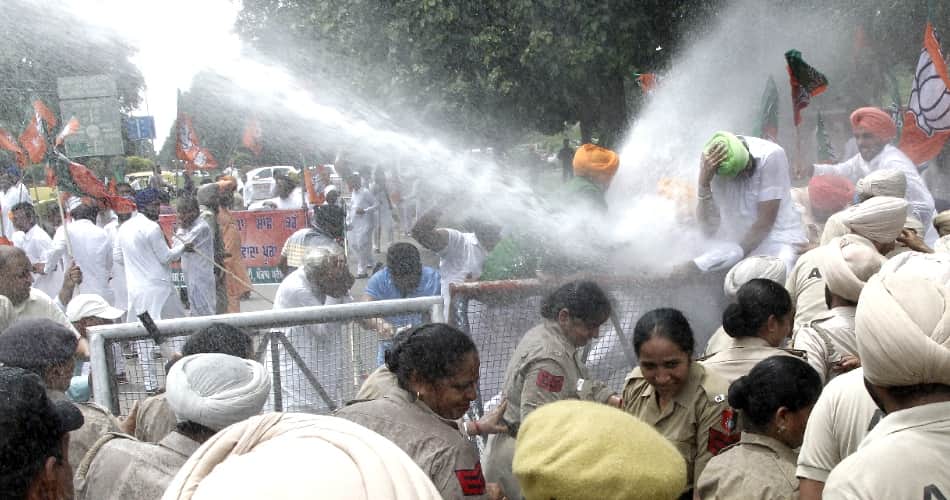 water cannon on protesters, chandigarh news