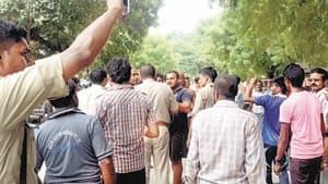 hightension wire falls on father-son, seriously injured 