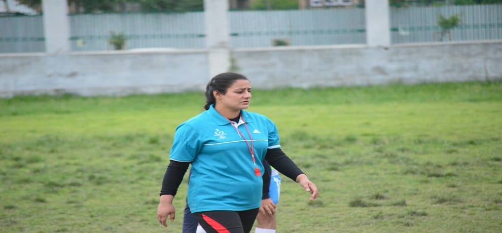 kashmiri girl Qudsiya Altaf football coach giving trainning to  stone pelters