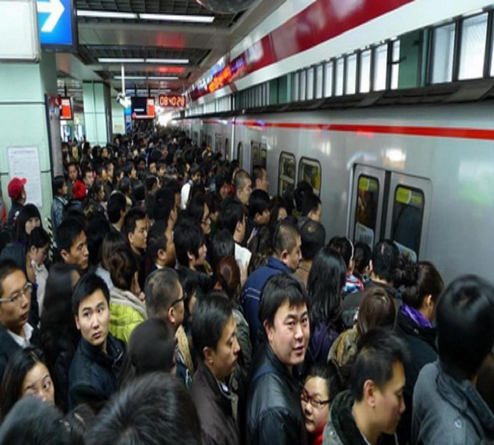 watch Viral Video of people pushing metro to rescue man stuck in platform gap in China