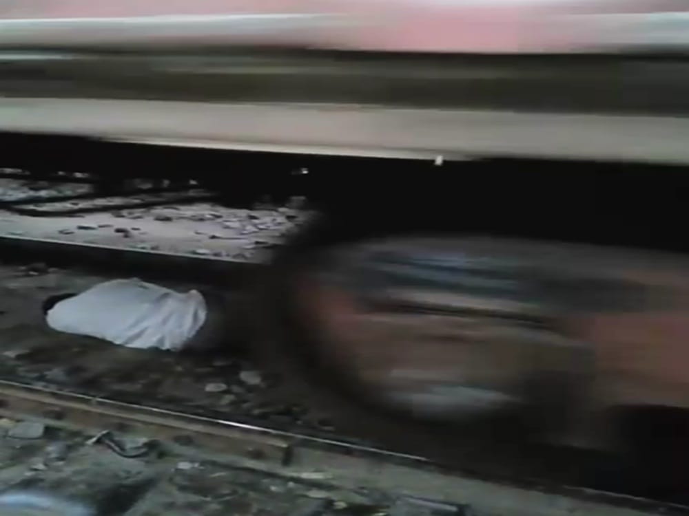 miracle saved Man life who fall under the running  train video viral